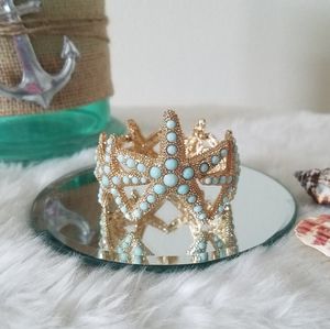 NWOT gold and seafoam starfish bracelet